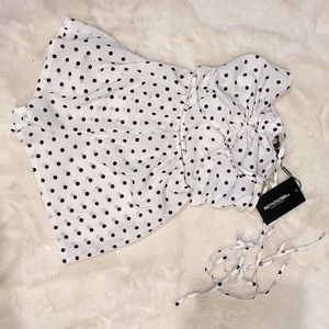 Pretty little thing size 2 polka dot romper